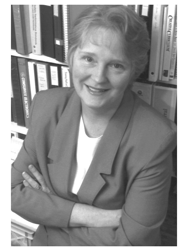 Gretchen Kinnell in a black and white headshot